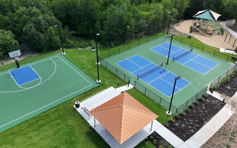 Aerial photo of community sports courts with trees