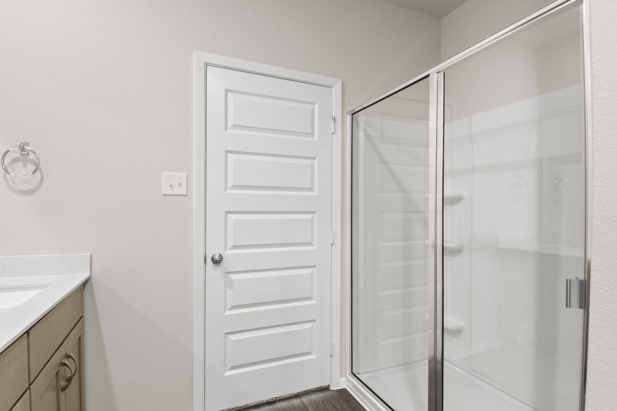 Image of primary bathroom with a standing shower