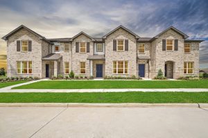 Brohn Homes showcase neighborhood in Pearland, Texas featuring modern new construction homes with manicured landscaping, tree-lined streets, and community amenities.
