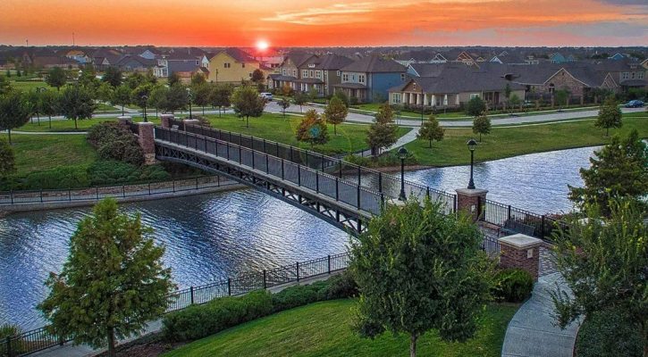 Scenic residential community in Cypress, Texas with waterfront views, walking paths, green spaces, and nearby new home neighborhoods in greater Houston