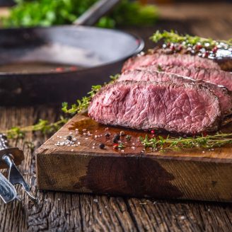 Family enjoying BBQ and diverse cuisine at restaurants near Brohn Homes new construction neighborhoods in Rosharon, Texas.