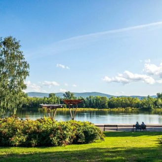 outdoors, Tomball Residents biking and hiking along wooded trails near Brohn Homes new construction in Tomball, Texas with scenic Spring Creek Greenway.
