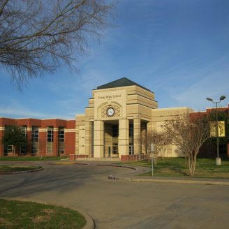 richmond-texas-schools Foster High School in Richmond, Texas with modern campus and clock tower—excellent schools attracting families to new homes in the Houston area