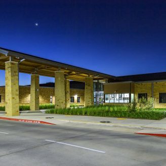 school, Sealy School-age children walking toward a modern Sealy ISD facility near Brohn Homes’ new construction neighborhoods in Sealy, Texas.