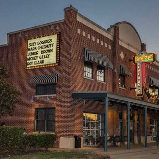 ShoppingTomball Shoppers browsing local boutiques and vintage shops along walkable Old Town Tomball streets near Brohn Homes community.