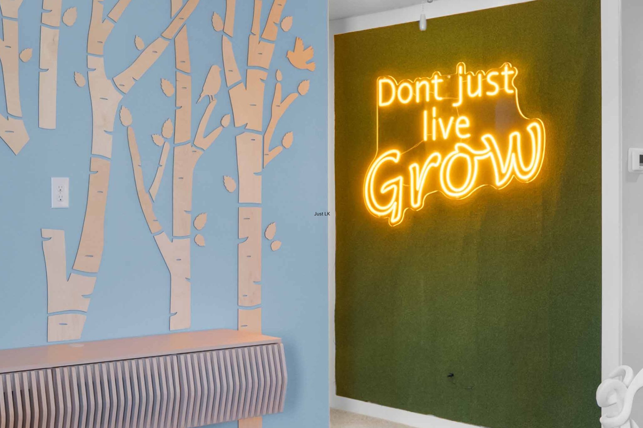 A closeup image of greenery with signage that lights up that say "Don't just live grow!"